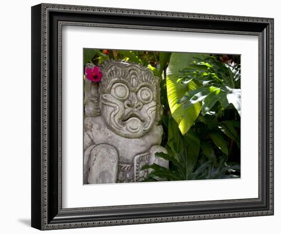 Bali, Ubud, a Stone Carving, Adorned with a Hibiscus Flower, Sits in Tropical Gardens-Niels Van Gijn-Framed Photographic Print