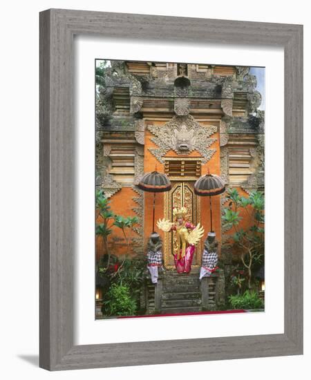 Balinese Dancer Wearing Traditional Garb Near Palace Doors in Ubud, Bali, Indonesia-Jim Zuckerman-Framed Photographic Print