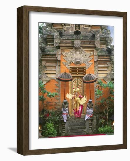 Balinese Dancer Wearing Traditional Garb Near Palace Doors in Ubud, Bali, Indonesia-Jim Zuckerman-Framed Photographic Print