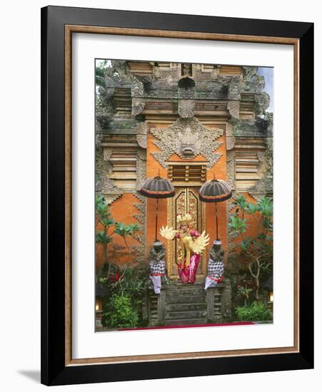 Balinese Dancer Wearing Traditional Garb Near Palace Doors in Ubud, Bali, Indonesia-Jim Zuckerman-Framed Photographic Print