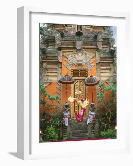 Balinese Dancer Wearing Traditional Garb Near Palace Doors in Ubud, Bali, Indonesia-Jim Zuckerman-Framed Photographic Print