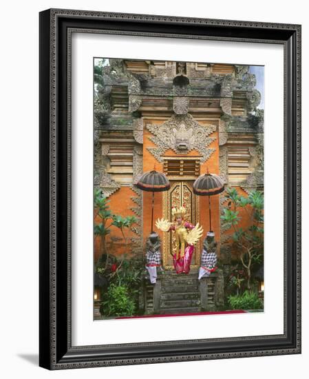 Balinese Dancer Wearing Traditional Garb Near Palace Doors in Ubud, Bali, Indonesia-Jim Zuckerman-Framed Photographic Print