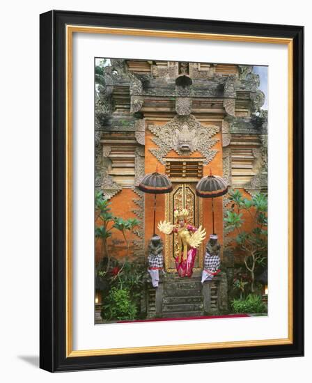 Balinese Dancer Wearing Traditional Garb Near Palace Doors in Ubud, Bali, Indonesia-Jim Zuckerman-Framed Photographic Print