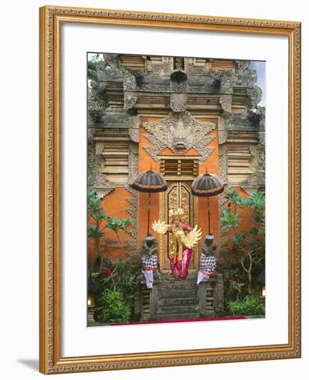 Balinese Dancer Wearing Traditional Garb Near Palace Doors in Ubud, Bali, Indonesia-Jim Zuckerman-Framed Photographic Print