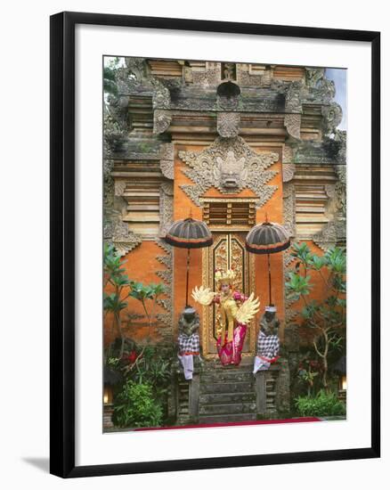 Balinese Dancer Wearing Traditional Garb Near Palace Doors in Ubud, Bali, Indonesia-Jim Zuckerman-Framed Photographic Print