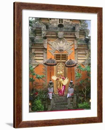 Balinese Dancer Wearing Traditional Garb Near Palace Doors in Ubud, Bali, Indonesia-Jim Zuckerman-Framed Photographic Print