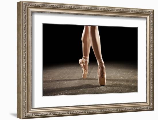 Ballerina Balancing En Pointe-null-Framed Art Print