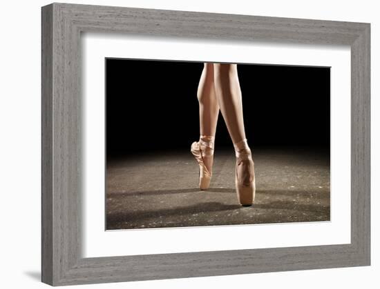 Ballerina Balancing En Pointe-null-Framed Art Print