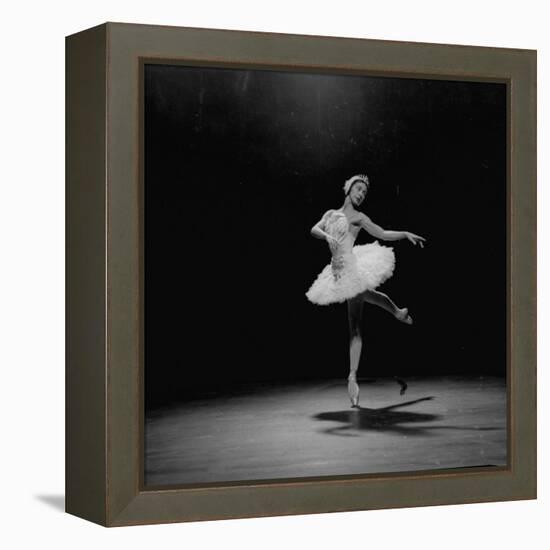 Ballerina Margot Fonteyn in White Costume Balanced on One Toe While Dancing Alone on Stage-Gjon Mili-Framed Premier Image Canvas
