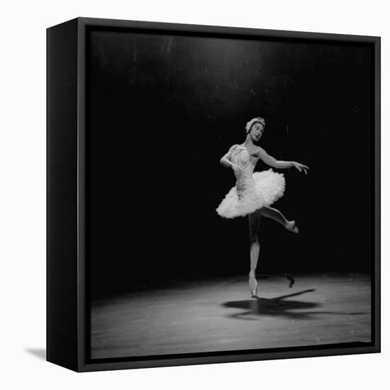 Ballerina Margot Fonteyn in White Costume Balanced on One Toe While Dancing Alone on Stage-Gjon Mili-Framed Premier Image Canvas