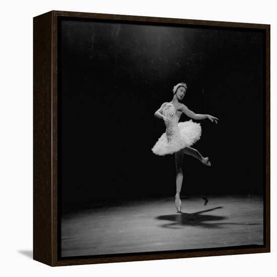 Ballerina Margot Fonteyn in White Costume Balanced on One Toe While Dancing Alone on Stage-Gjon Mili-Framed Premier Image Canvas