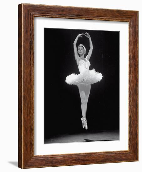 Ballerina Margot Fonteyn in White Costume Leaping into the Air While Dancing Alone on Stage-Gjon Mili-Framed Premium Photographic Print