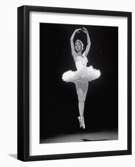 Ballerina Margot Fonteyn in White Costume Leaping into the Air While Dancing Alone on Stage-Gjon Mili-Framed Premium Photographic Print