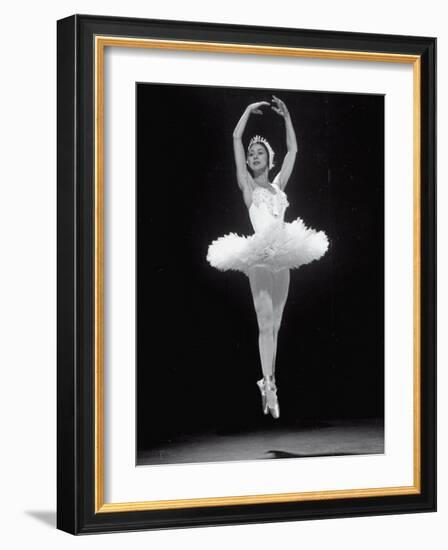 Ballerina Margot Fonteyn in White Costume Leaping into the Air While Dancing Alone on Stage-Gjon Mili-Framed Premium Photographic Print