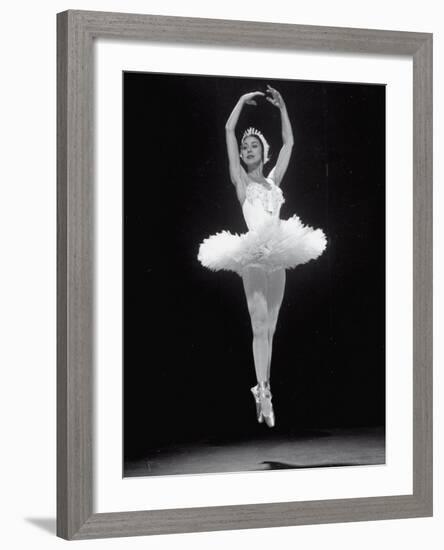 Ballerina Margot Fonteyn in White Costume Leaping into the Air While Dancing Alone on Stage-Gjon Mili-Framed Premium Photographic Print