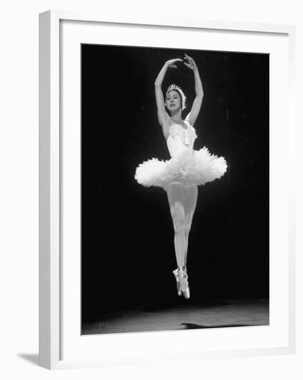 Ballerina Margot Fonteyn in White Costume Leaping into the Air While Dancing Alone on Stage-Gjon Mili-Framed Premium Photographic Print