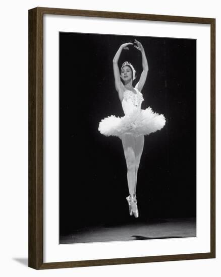 Ballerina Margot Fonteyn in White Costume Leaping into the Air While Dancing Alone on Stage-Gjon Mili-Framed Premium Photographic Print