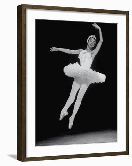 Ballerina Margot Fonteyn in White Costume Leaping into the Air While Dancing Alone on Stage-Gjon Mili-Framed Premium Photographic Print