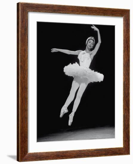 Ballerina Margot Fonteyn in White Costume Leaping into the Air While Dancing Alone on Stage-Gjon Mili-Framed Premium Photographic Print