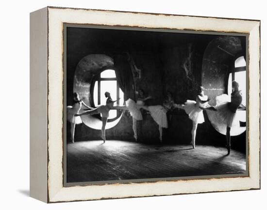 Ballerinas at Barre Against Round Windows During Rehearsal For "Swan Lake" at Grand Opera de Paris-Alfred Eisenstaedt-Framed Premier Image Canvas