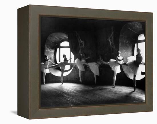 Ballerinas at Barre Against Round Windows During Rehearsal For "Swan Lake" at Grand Opera de Paris-Alfred Eisenstaedt-Framed Premier Image Canvas