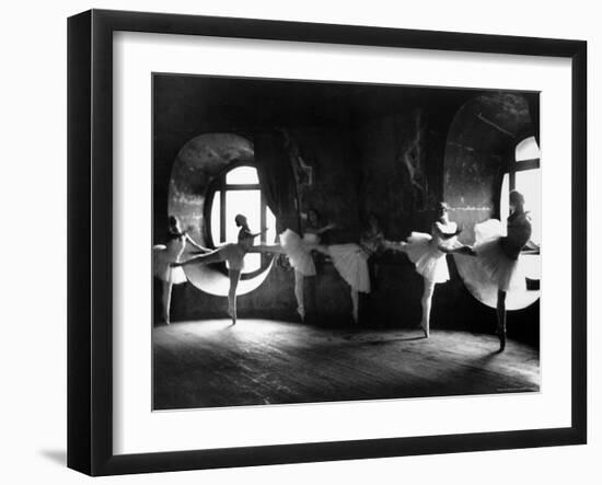 Ballerinas at Barre Against Round Windows During Rehearsal For "Swan Lake" at Grand Opera de Paris-Alfred Eisenstaedt-Framed Premium Photographic Print