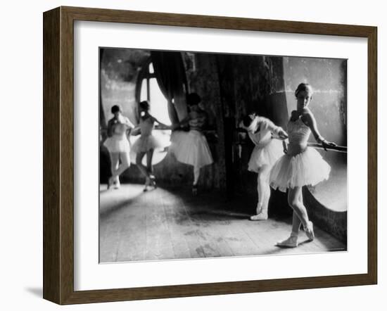 Ballerinas at Barre Against Round Windows During Rehearsal For "Swan Lake" at Grand Opera de Paris-Alfred Eisenstaedt-Framed Photographic Print