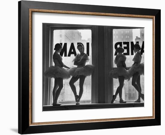 Ballerinas Standing on Window Sill in Rehearsal Room, George Balanchine's School of American Ballet-Alfred Eisenstaedt-Framed Premium Photographic Print