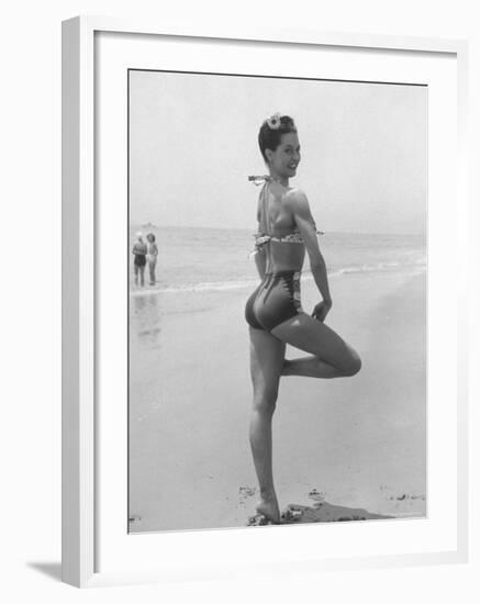 Ballet Dancer Cyd Charisse Who Also Aspires to Being a Movie Star, Posing at Santa Monica Beach-Peter Stackpole-Framed Premium Photographic Print