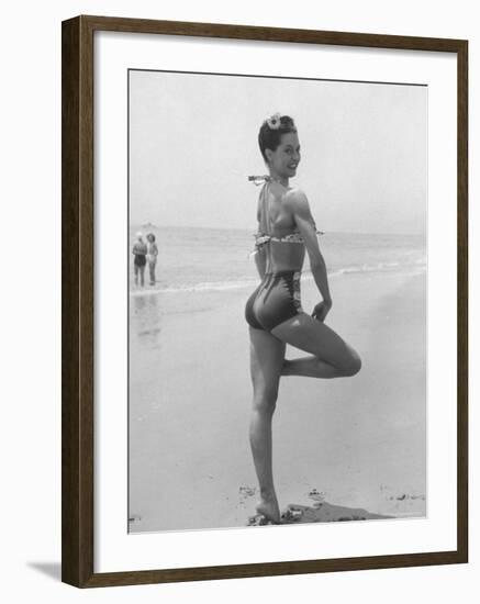 Ballet Dancer Cyd Charisse Who Also Aspires to Being a Movie Star, Posing at Santa Monica Beach-Peter Stackpole-Framed Premium Photographic Print