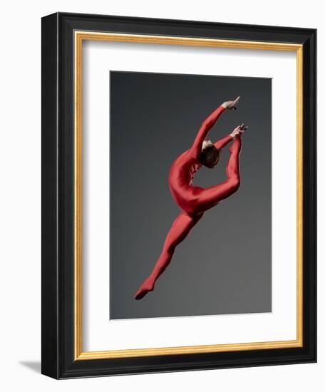 Ballet Dancer in Red Leotard-Erik Isakson-Framed Photographic Print