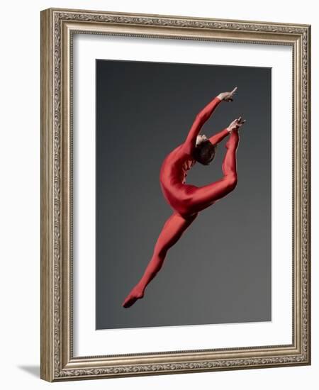 Ballet Dancer in Red Leotard-Erik Isakson-Framed Photographic Print