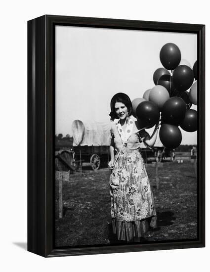 Balloon Seller-null-Framed Premier Image Canvas