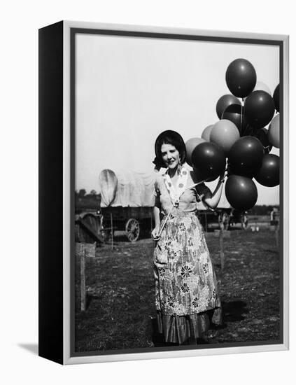 Balloon Seller-null-Framed Premier Image Canvas