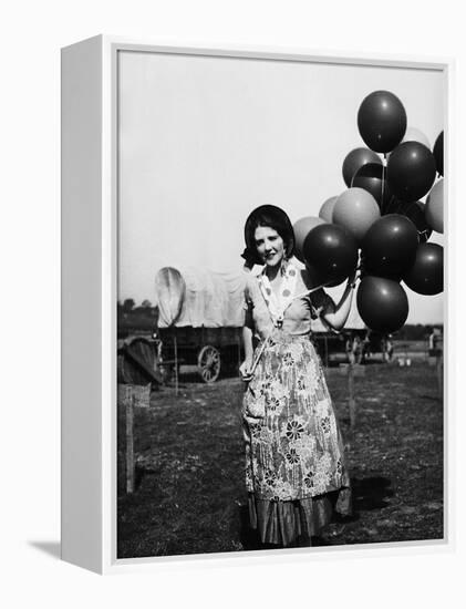 Balloon Seller-null-Framed Premier Image Canvas