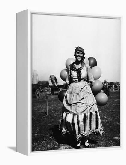 Balloon Seller-null-Framed Premier Image Canvas