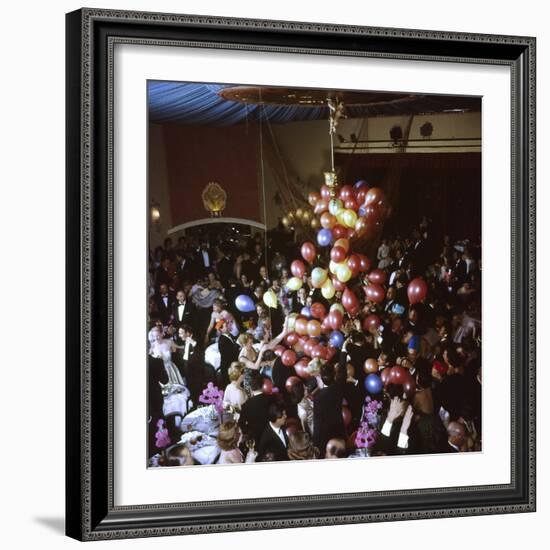 Balloons Dropping on Guests During New Year's Eve Celebration at Palace Hotel-Loomis Dean-Framed Photographic Print