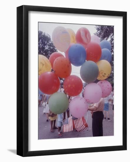 Balloons Sold by Man to People Watching Events, Kosygin's Second Visit to Glassboro, New Jersey-Art Rickerby-Framed Photographic Print