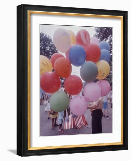 Balloons Sold by Man to People Watching Events, Kosygin's Second Visit to Glassboro, New Jersey-Art Rickerby-Framed Photographic Print