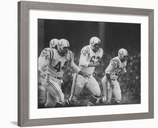 Baltimore Colts Playing Against the New York Giants-null-Framed Premium Photographic Print