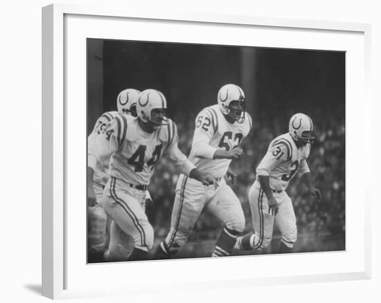 Baltimore Colts Playing Against the New York Giants-null-Framed Premium Photographic Print