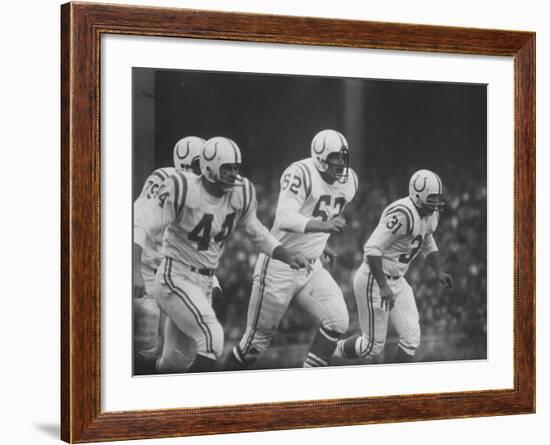 Baltimore Colts Playing Against the New York Giants-null-Framed Premium Photographic Print