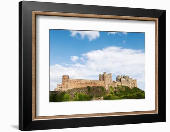 Bamburgh Castle, a fortress constructed on top of a craggy outcrop of volcanic dolerite-Stuart Forster-Framed Photographic Print