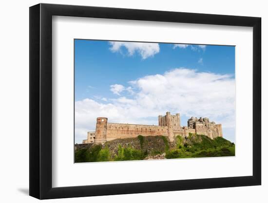 Bamburgh Castle, a fortress constructed on top of a craggy outcrop of volcanic dolerite-Stuart Forster-Framed Photographic Print