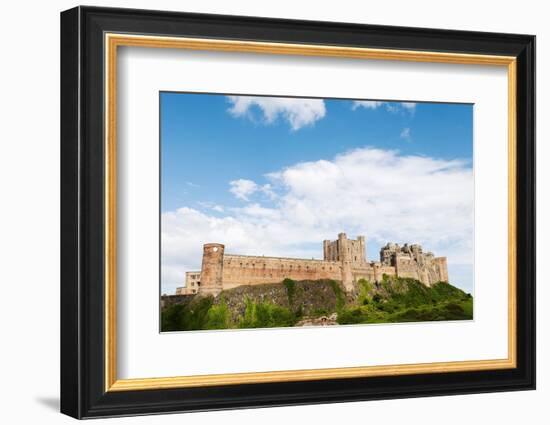 Bamburgh Castle, a fortress constructed on top of a craggy outcrop of volcanic dolerite-Stuart Forster-Framed Photographic Print