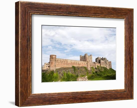 Bamburgh Castle, a hilltop fortress and Grade I Listed Building, Bamburgh, Northumberland, England-Stuart Forster-Framed Photographic Print