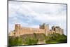 Bamburgh Castle, a hilltop fortress and Grade I Listed Building, Bamburgh, Northumberland, England-Stuart Forster-Mounted Photographic Print