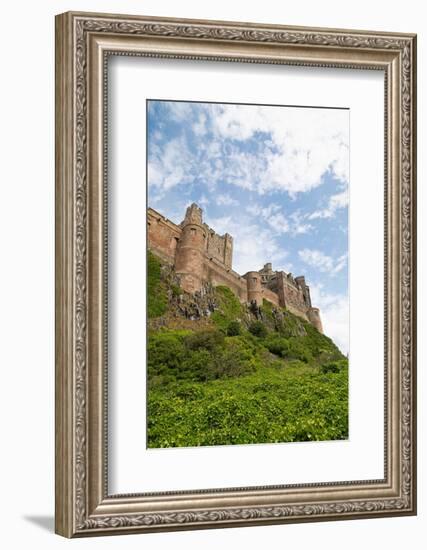 Bamburgh Castle, a hilltop fortress constructed on top of a craggy outcrop of volcanic dolerite-Stuart Forster-Framed Photographic Print