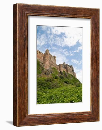 Bamburgh Castle, a hilltop fortress constructed on top of a craggy outcrop of volcanic dolerite-Stuart Forster-Framed Photographic Print