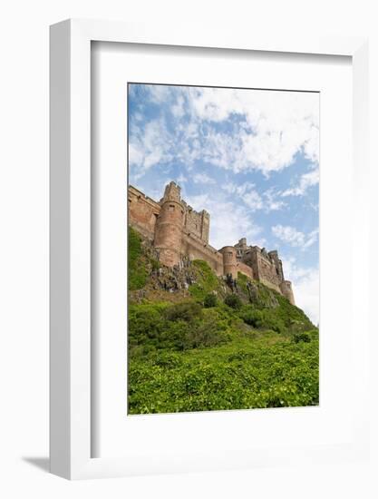 Bamburgh Castle, a hilltop fortress constructed on top of a craggy outcrop of volcanic dolerite-Stuart Forster-Framed Photographic Print